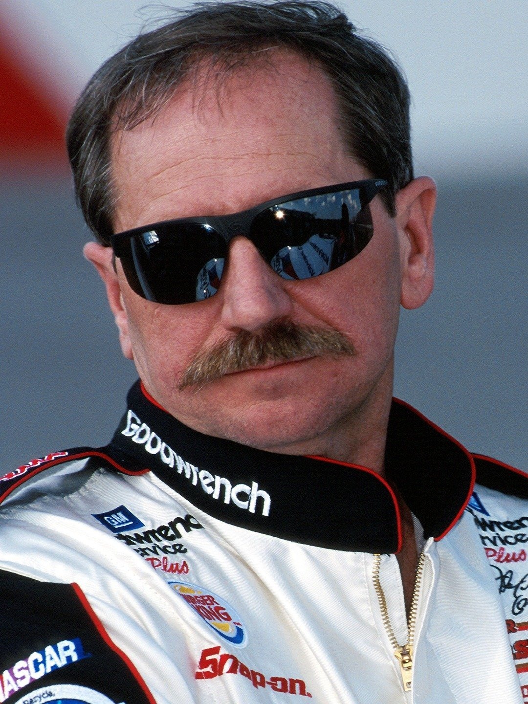 Dale Earnhardt holds his classic pose wearing his trademark sunglasses at Rockingham Internationa Speedway, February of 2000. (Newscom TagID: iconphotos258988.jpg) [Photo via Newscom]